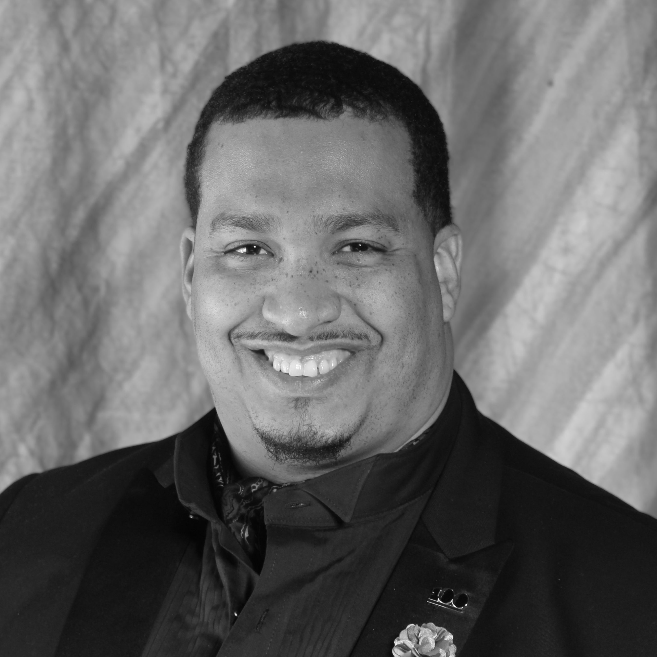 100BMBA HEADSHOT - Logan McDonnell BW